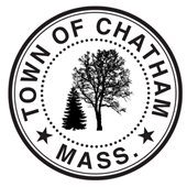 Town seal with a pine tree and a deciduous tree with leaves in the center.