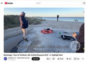 Screen shot of YouTube video showing drone team on a beach