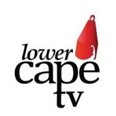 Red Nun buoy with Lower Cape Tv in black letters to its left