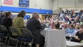 Voters seated in the Middle School gym at 2024 Annual Town Meeting
