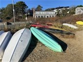 kayaks and dinghies hauled out at a Town landing