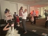 Dads and daughters dancing together