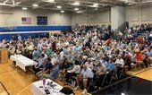 Voters seated in the gymnasium at the Sept. 16 2024 Special Town Meeting