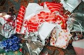 A pile of discarded holiday wrapping paper