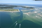 Aerial view of the Stage Harbor entrance channel from August 2024