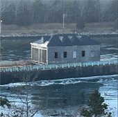 US Coast Guard Boathouse on a barge in the Cape Cod Canal
